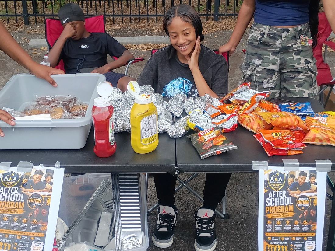 Serving our neighbors at A & A Rising Stars